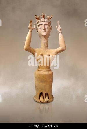 Minoan Postpalatial terracotta  goddess statue with raised arms and bird crown,  Karphi Sanctuary 1200-1100 BC, Heraklion Archaeological Museum.   The Stock Photo