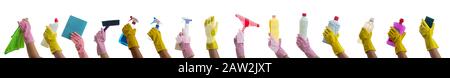 Cleaning, hand holding cleaning products and accessories isolated against white background. Cleaner rubber glove with cleaning supplies collage. Stock Photo