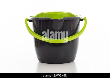 Cleaning mop bucket green black color isolated against white background, Domestic household cleaning Stock Photo