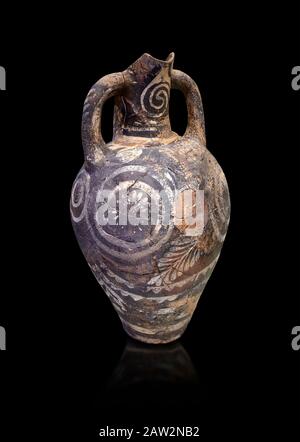 Minoan Kamares Ware ewer jug with polychrome decorations , Phaistos 1900-1700 BC; Heraklion Archaeological  Museum, black background.  This style of p Stock Photo