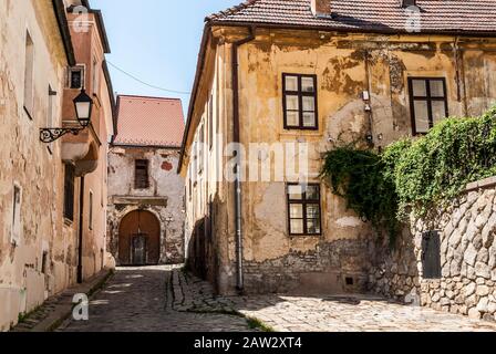Narrow Alley With Old Buildings In Typical Central European Medieval Town (Bratislava) Slovakia Stock Photo