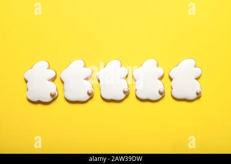 Easter cookies on a yellow background. Easter bunnies. Top view. Place for text. Stock Photo