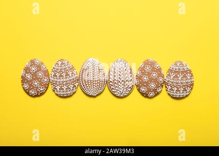 Easter cookies on a yellow background. Place for text. Easter eggs. Stock Photo