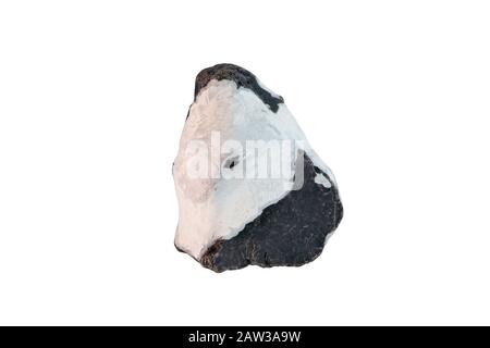 Natural boulder stone. Beautiful black and white rock isolated on white background. Heavy big stone cut out. Stock Photo