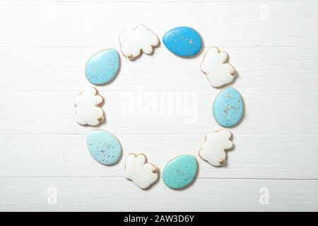 Easter cookies on concrete background. Easter bunnies. Place for text. Top view. Place for text. Easter eggs. Stock Photo