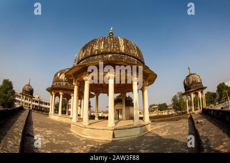 India, Rajasthan, Shekhawati, Mandawa, Goenka Chhatris, domed pavillions on platform of cenotaph to wealthy Poddar family, fisheye wide angle view Stock Photo