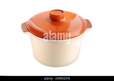 Saucepan. Ceramic saucepan with red cover isolated on white background.  Orange cooking pottery. Stock Photo