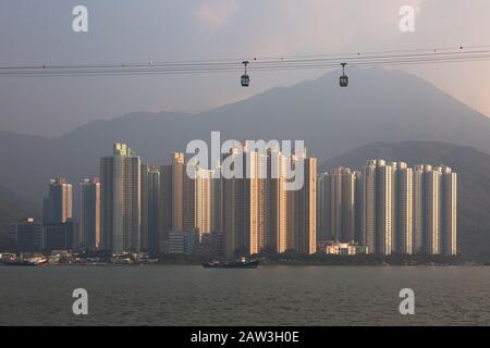 Tung Chung town with skyscrapers and the Lantau Island Cable Car, Lantau Island, Hong Kong Asia Stock Photo