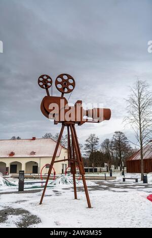 Sculpture of old fashioned film movie camera at the Estonian Film Museum at Maarjamäe Palace, Tallinn, Estonia, on a snowy winter's day Stock Photo