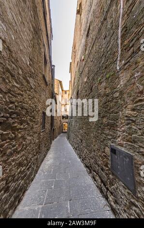 Ancient and characteristic medieval alley in Tuscany Stock Photo