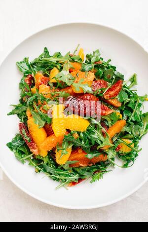 Citrus Arugula Salad with blood orange, cara cara and naval oragnes Stock Photo