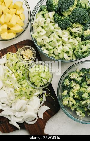 Chopped veggies for a potato broccoli soup recipe Stock Photo