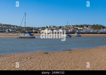 View of Appledore from Instow beach with boats in the river on a sunny day in North Devon. Stock Photo