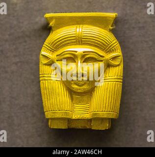 Cairo, Egyptian Museum, pendant found in the tomb of a prince Sheshonq in Memphis. 22nd dynasty, reign of Osorkon 2. Head of the goddess Hathor. Stock Photo