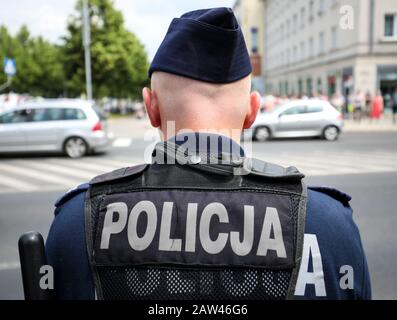 Polish policemen in action on the street Stock Photo