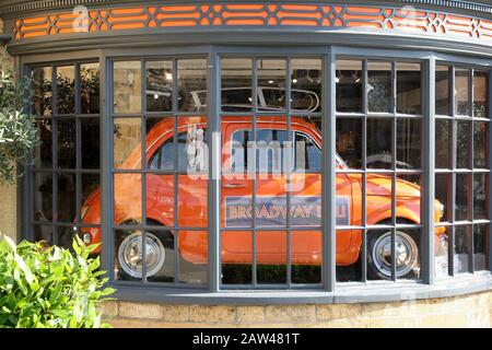 Fiat 500 car in deli window display Stock Photo