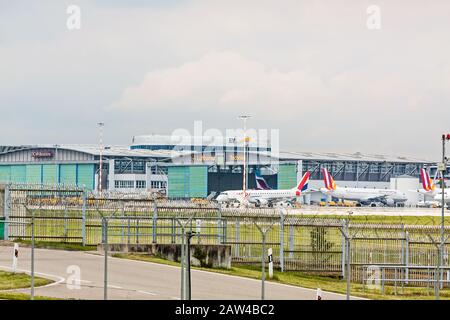 Stuttgart, Germany - April 29, 2017: Airport Stuttgart, planes in front of Lufthansa Technik hangar Stock Photo
