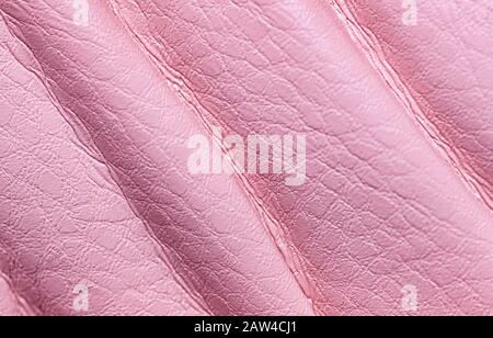 Natural pink leather texture. Close up. Useful as background for design-works. Stock Photo