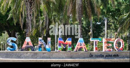 In front of the town square park in San Mateo, Costa Rica, colourful interesting block letters spell out the town name. Stock Photo