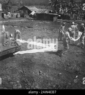 Treatment Action Area Pagaralem South Sumatra  Regularly from Pagaralem (Zd-Sum) purges undertaken, with the infantry mainly receives support from the carriers, while a Pipercup maintains regular communication with the various outposts. Using signal cloths are to be granted the observer Pipercup data which is the column. Date: March 18, 1949 Location: Indonesia, Dutch East Indies, Sumatra Stock Photo