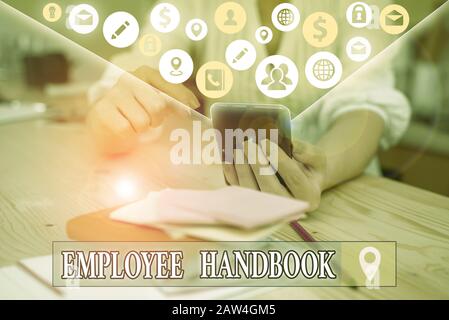 Text sign showing Employee Handbook. Business photo text states the rules and regulations and policies of a company Stock Photo