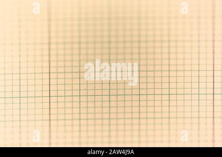Close-up of a grid sheet with a partial blur effect and old color. For backgrounds and textures Stock Photo
