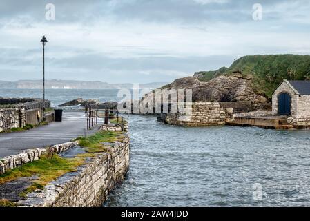 This is the small harbour at Ballintoy  on the North Antrim Coast in Northern Ireland Stock Photo