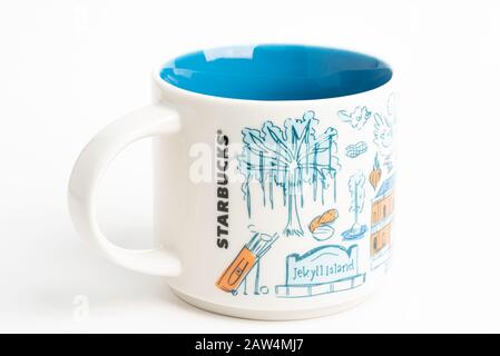 Vidalia, Georgia / USA - September 27, 2019: A product shot of a Starbucks mug with iconic Georgia-inspired illustrative designs. Stock Photo