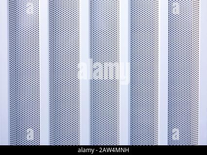 A set of numbers (1234567890), silver metal perforated with small holes  isolated on white background close-up Stock Photo - Alamy