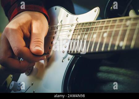 red jacket with white strings