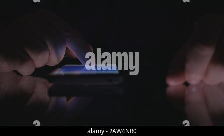 Businessman Hands Using cell Phone Application Accessing Online Financial Information Stock Photo