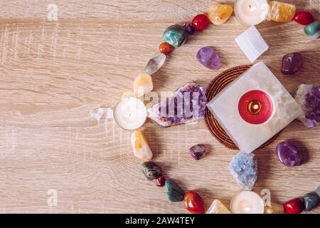 Setting up a semi precious stone crystal grid in home helps your intentions to manifest concept. Alternative lifestyle. Stock Photo