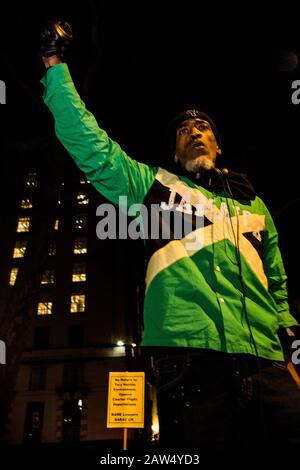 London UK 6th Feb 2020 A man raises a black-gloved fist in the air during demonstration in whithall against an upcoming removal flight expected to transport up to 50 people to Jamaica on 11 February. . Credit: Thabo Jaiyesimi/Alamy Live News