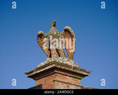 Stone eagle guarding the entrance to Thirlestane Castle, Lauder, Berwickshire, Scottish Borders, UK Stock Photo