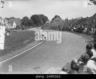 TT Assen 1953  L. Simons (Netherlands) on AJS in class 350cc Annotation: S-curve to Hooghalen Date: June 28, 1953 Location: Assen Keywords: motorsport Person Name: Simons, LH Institution Name: TT Stock Photo