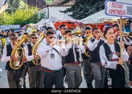 Brass band defile in Trumpet festival in Guca Stock Photo