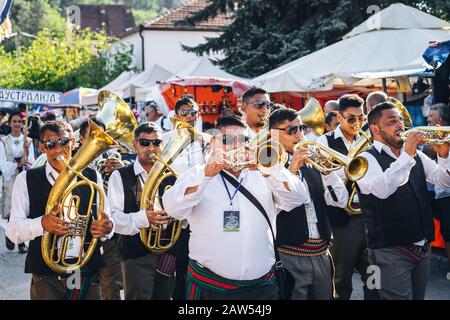 Brass band defile in Trumpet festival in Guca Stock Photo