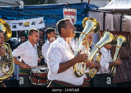 Brass band defile in Trumpet festival in Guca Stock Photo