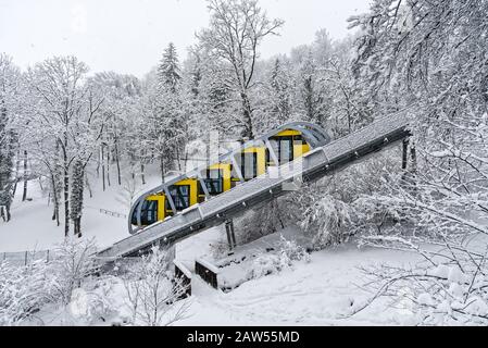 The Nordkettenbahn in Innsbruck connecting the city center and Hungerburg district. Innsbruck is the capital of the alps and perfect for ski adventure Stock Photo