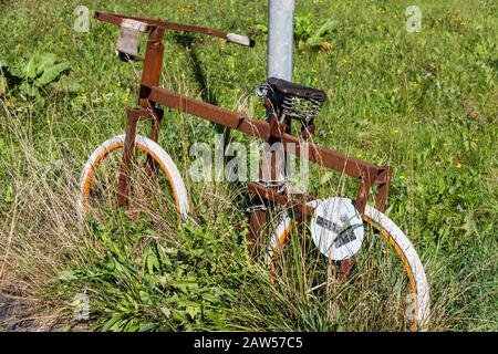 Old rusty, strange, funny bicycle.