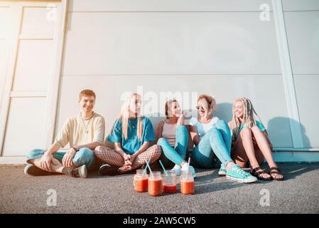 Group of young people with smoothie drinks Stock Photo