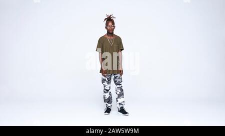 Young african man standing isolated on white background. Young man in casual clothes with dreadlocks tied together. Stock Photo