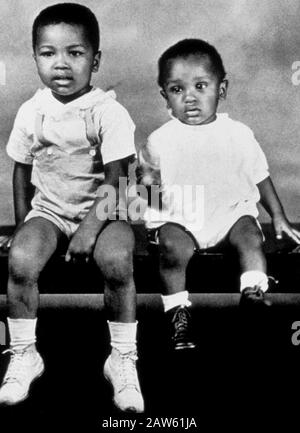 1946 ca , Louisville , Kentucky , USA : The future boxer Muhammad Ali ( 1942 - 2016 ) born Cassius Marcellus CLAY Jr.  with the young brother Rudolph Stock Photo