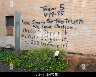 A message written by rescuers on a building beside the Oklahoma City bombing site in 1995 has been repainted and is part of the national memorial. Stock Photo