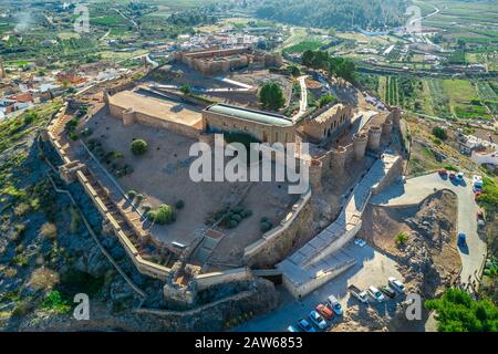 Aerial view of medieval Onda castle near the capital of tile factories in Castillon Spain with an curtain wall strengthened by semi circular towers Stock Photo