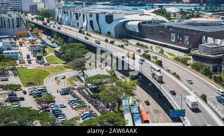 Singapore, April, 2019. View of the highway seen from Singapore Cable Car. It's a gondola lift providing an aerial link from Mount Faber on the main i Stock Photo