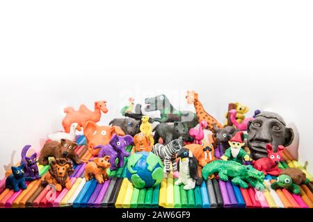 Animals made from Play Clay with Earth Planet in middle. Stock Photo