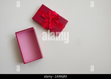 Directly above shot of red open gift isolated on white background Stock Photo
