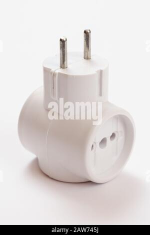 Plastic electrical tee connector with three sockets on a white background. Stock Photo