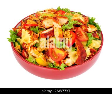 Chicken tikka and pasta salad bowl isolated on a white background Stock Photo